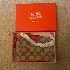 A brand new coach wristlet